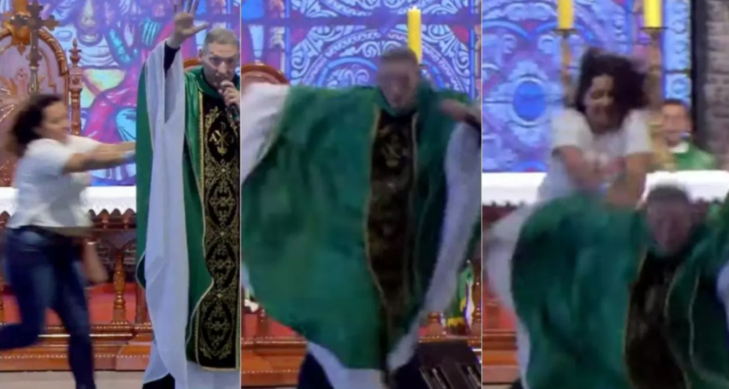 Mulher empurra Padre Marcelo Rossi em altar
